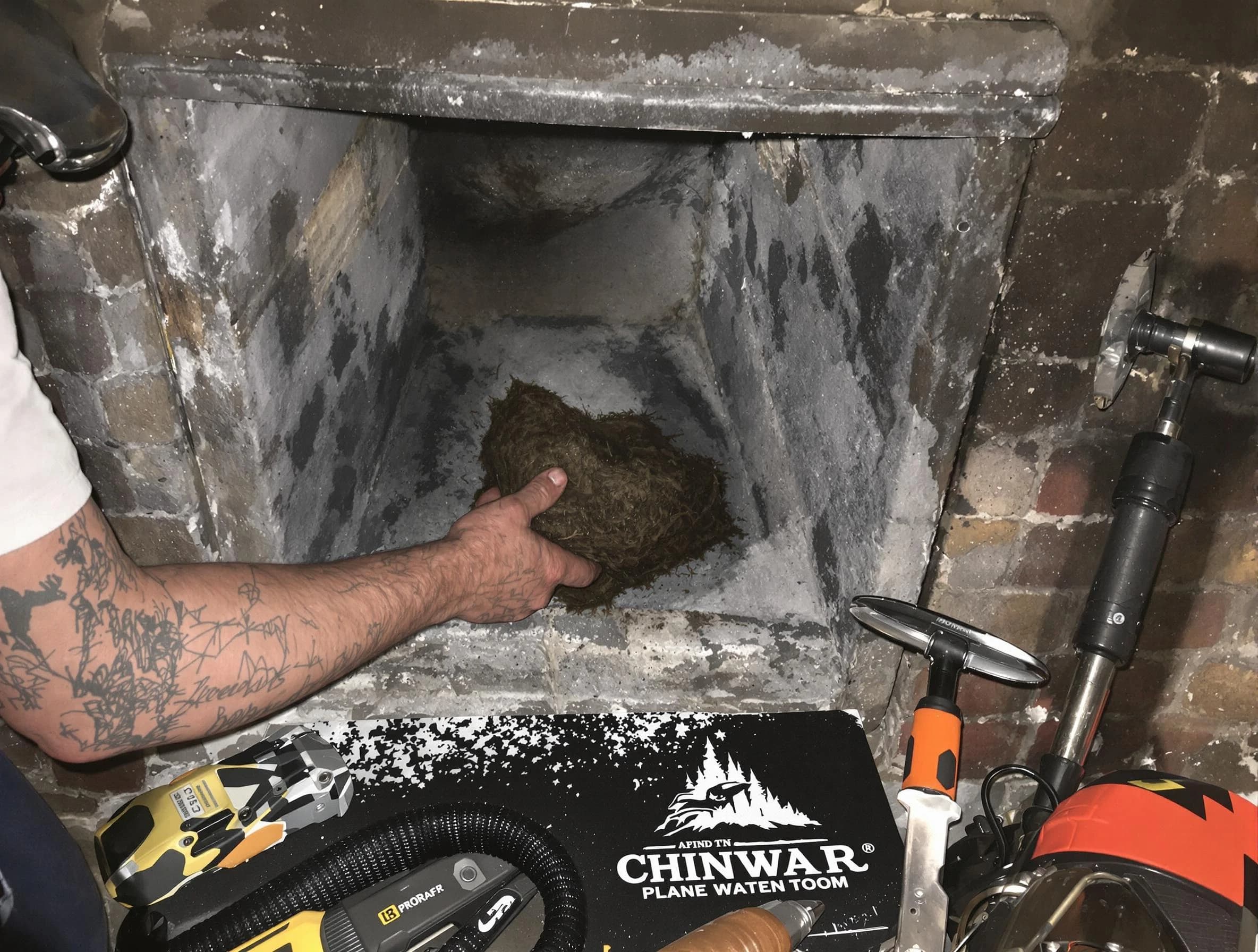 North Versailles Chimney Sweep safely removing debris and screening chimney in North Versailles, PA